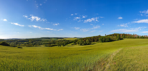 scenic panorama view of natural landscape under a cloudy sky