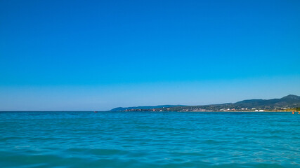 Fototapeta premium Blue water of Tyrrhenian sea in Vada, Tuscany, Italy.