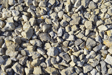 
Gray gravel texture. Crushed stone for road construction for street improvement. Materials for the road.