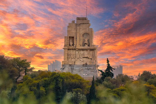 The monument in Philopappou Hill in Athens, greece against a dramatic sky