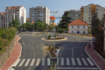 Obraz premium Road with a circular motion. Montenegro, Tivat city. View of Adriatic Highway (Jadranska magistrala)