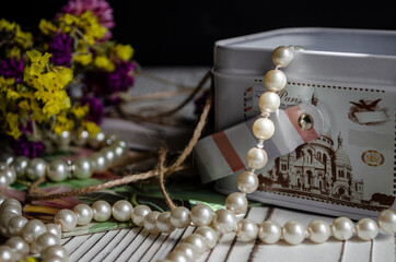 vintage box on the table with pearl jewelry