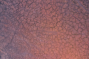 Drought Top View. Aerial view of a cracks in the ground. texture. Desert landscape.
