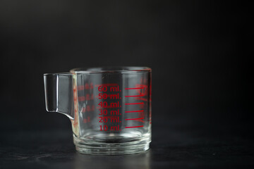 Volumetric measuring glass
