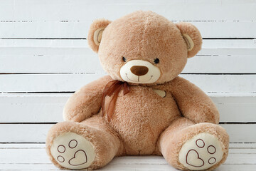 teddy bear on a wooden background