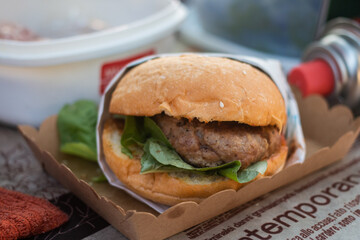Close up Hamburger serve on paper plate. 