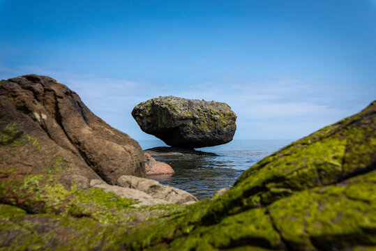 Balance Rock, a popular and famous attraction near the village of Skidegate in Haida Gwaii (formerly Queen Charlotte Islands), British Columbia, Canada.