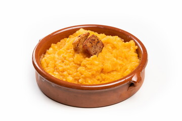 Scrambled potatoes with bacon traditional Spanish food with white background