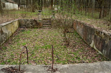 photo of an abandoned pool in an old pioneer camp