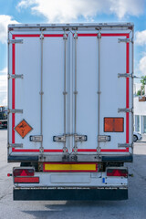 Truck transporting explosives, danger label according to the ADR identifies explosives in the...