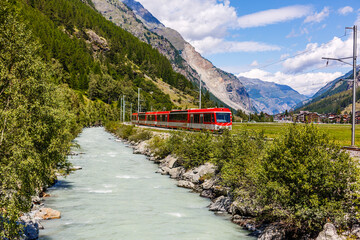 Swiss mountain train crossed Alps, railway in the mountains