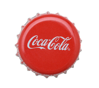 IRVINE, CALIFORNIA - 4 JUNE 2020: Closeup of a Coca-Cola bottle cap on white.