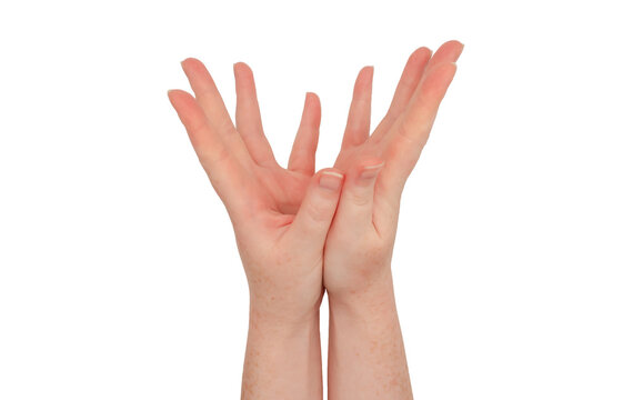 Freckled White Hands, Heels Of Hands Together, Fingers Splayed And Cupped, Palms Together.  Female Hand Isolated.  Hand Casting A Spell Or Prayer Gesture