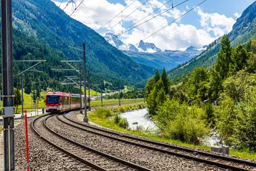 Fotobehang Landwasserviaduct Swiss mountain train crossed Alps, railway in the mountains