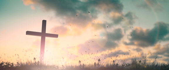 Silhouette jesus christ crucifix on cross on calvary sunset background concept for good friday he...