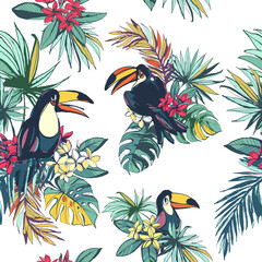 Tropical floral summer seamless pattern with palm beach leaves, tropical flowers and toucan birds. © svsunny