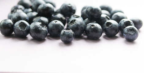 ripe blueberries on a white background close up