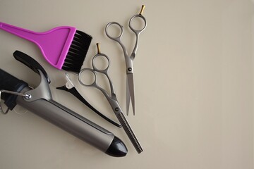 Tools for the work of a hairdresser and stylist in a beauty salon. High quality photo for banner design, website.