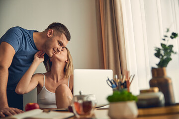 Happy famile couple enjoying time together at home
