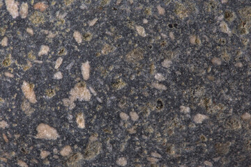 The texture of a granite stone, close-up. Background.