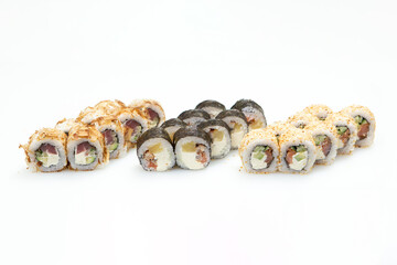 Sets of different sushi roles on a white background