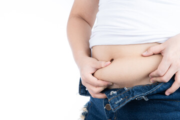 Fat woman holding excessive fat belly, overweight fatty belly isolated on over white background. Diet lifestyle, weight loss, stomach muscle, healthy concept.