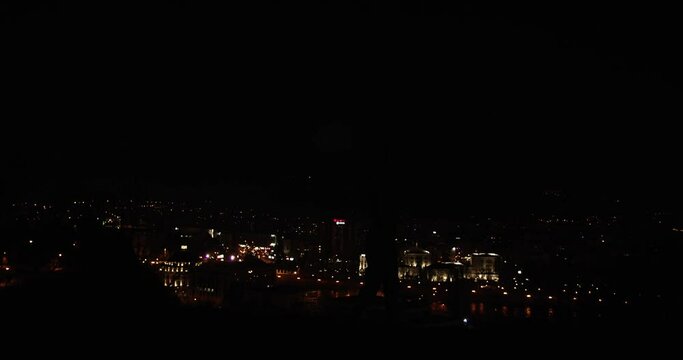 Silhouette of a male dancer dancing in the night, slow motion, low key footage