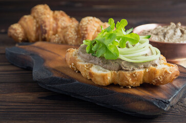 homemade meat pate on croissant.