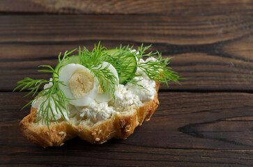 Croissant with cheese and herbs.
