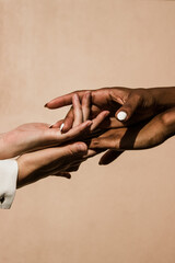 white and black people holding hands