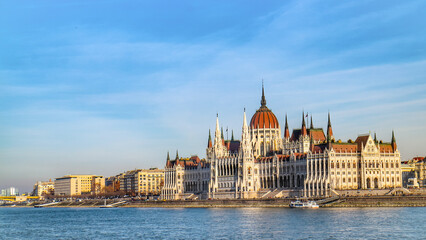 Obraz premium Hungarian parliament building on the banks of the Danube river in the Pest part of Budapest, capital of Hungary.