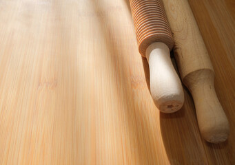 dough table with wooden rolling pins