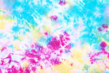 colorful tie dye pattern hand dyed on cotton fabric abstract texture background.