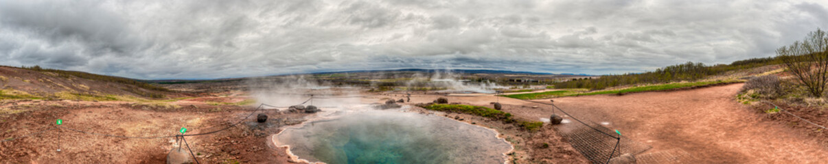 Strokkur is a geyser in the geothermal region near the Hvitá River and Reykjavik city, considered one of the most famous geysers in Iceland. Panoramic