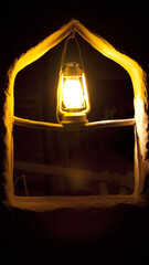 A lamp in the window 