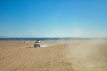 Fototapeta na wymiar car in the sand