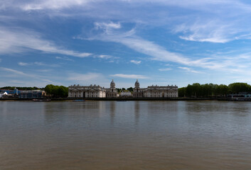 Obraz premium A view of the river Thames and Royal Naval College, London, United Kingdom.