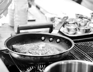Chef cooking in a kitchen, chef at work, Black & White.