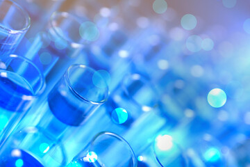 Test tubes with blue liquid, closeup. Laboratory analysis
