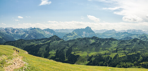 Trekking in the European Alps, Kleinwalsertal, Vorarlberg, Austria. It is the view from the plateau of the mountain Hoher Ifen (2230 m) southwards to the Grosser Widderstein (2533 m)