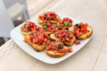 Appetizer of bruschetta with tuna