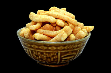 French fries with bowl on black background