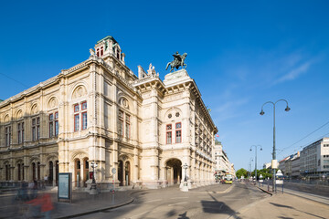 Fototapeta na wymiar Blurred Traffic In Front Of The Vienna State Opera, Austria