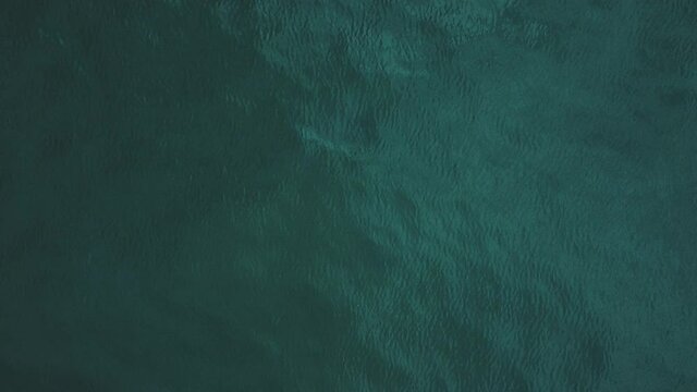 Aereal cenital view of the sea water in Caldes d'Estrach, Spain, Europe.