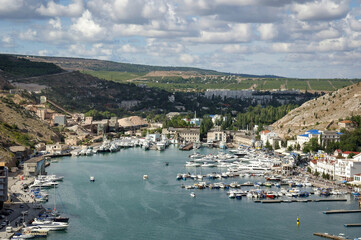 Fototapeta na wymiar View of a quiet bay with yachts and boats