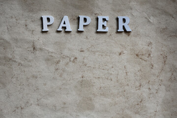 Paper word on paper background