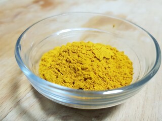 Selective focus on turmeric powder for cooking