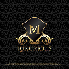 Shield Luxury Logo Letter M Logo Icon Design Template Elegance Ornate Floral Leaf, Classy monogram vintage logo vector design concept for luxuries business