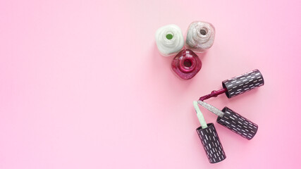 an open tube of nail Polish. Red green brown nail Polish photo