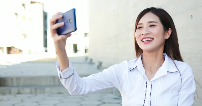 Asiian businesswoman has video chat